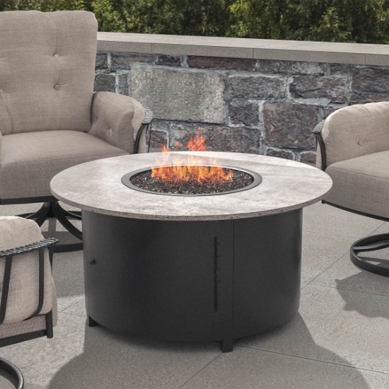 Phoenix 42" Chat Height Steel Fire Pit with Dekton Top lifestyle