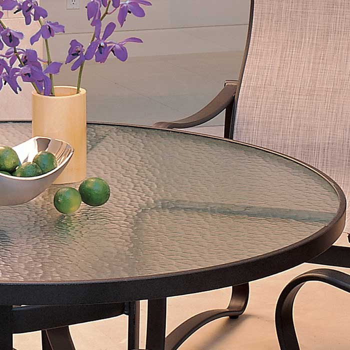 Tropitone acrylic dining table with aluminum base